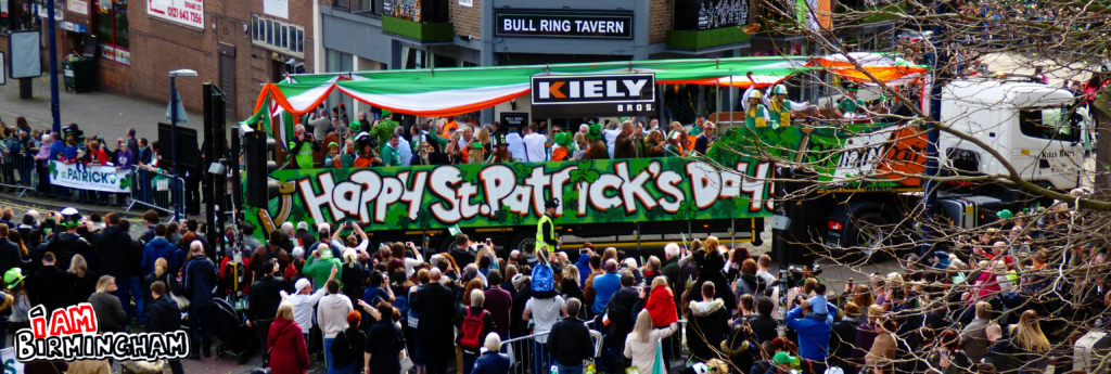 Floats make their way down Digbeth High Street as the Emerald Mile turns green for St Patricks Day
