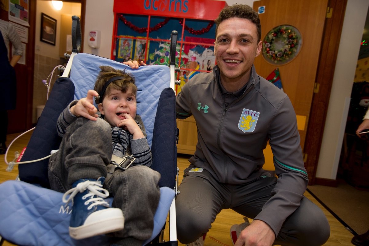 Villa and Wolves players visit young patients to spread festive cheer