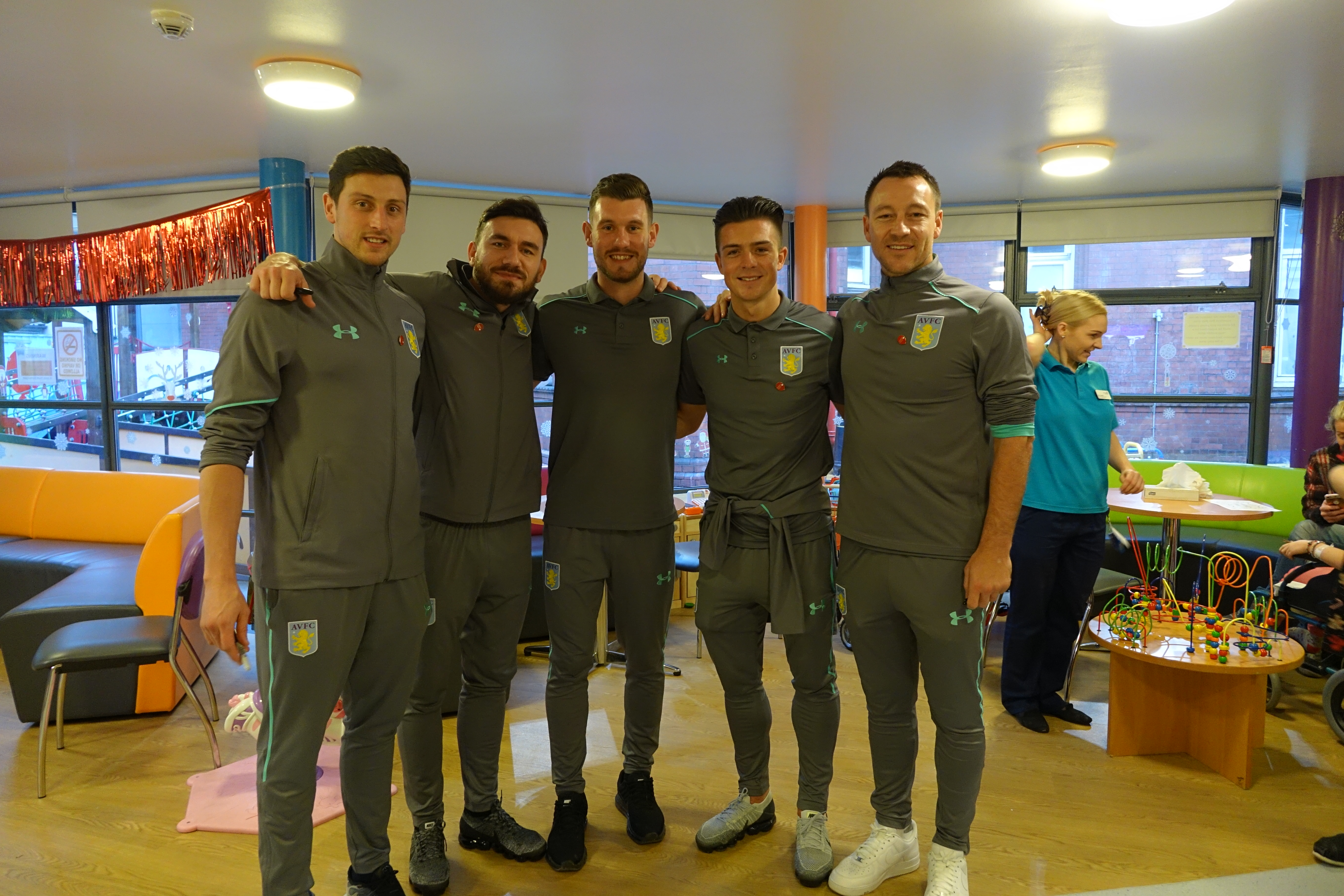 Team players from Aston Villa FC visited Birmingham Children's Hospital and Acorn's Children's Hospice in the West Midlands to spread Christmas cheer