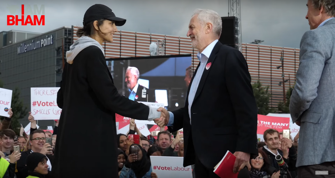 Saffiyah Khan on stage in Birmingham with Labour party leader Jeremy Corbyn in June