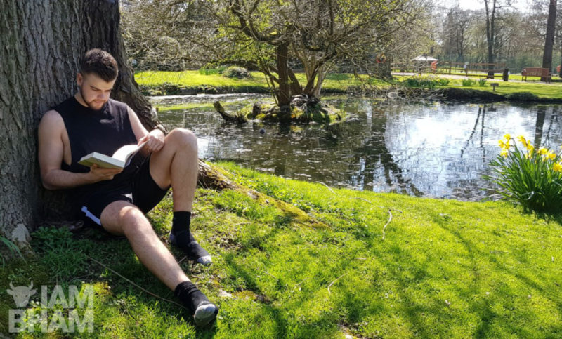 Tom relaxing in Sutton Park reading 'Hearts and Minds'