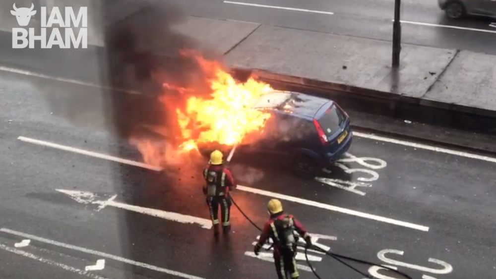 Car crashes and bursts into flames in busy Birmingham city centre street