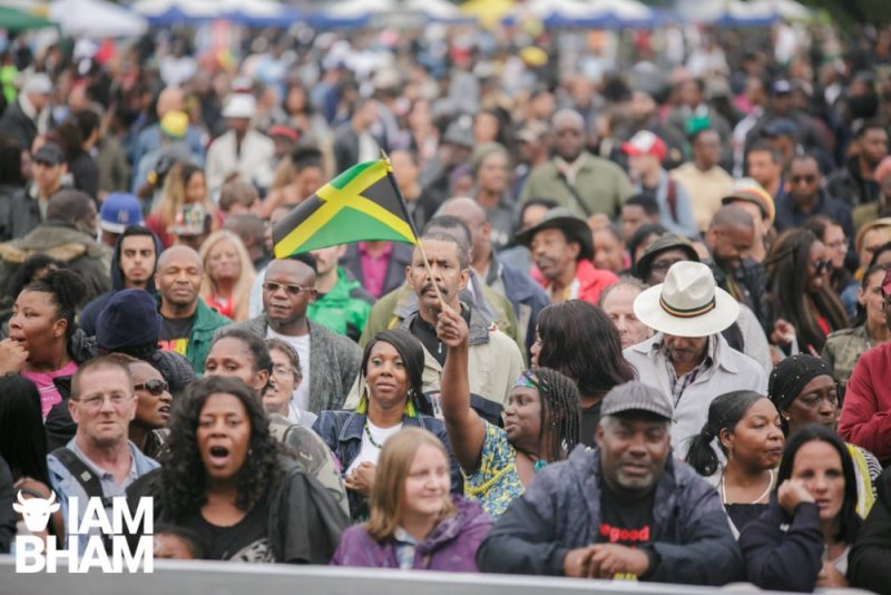 Jamaican flag and crowds at Simmer Down Festival 2018