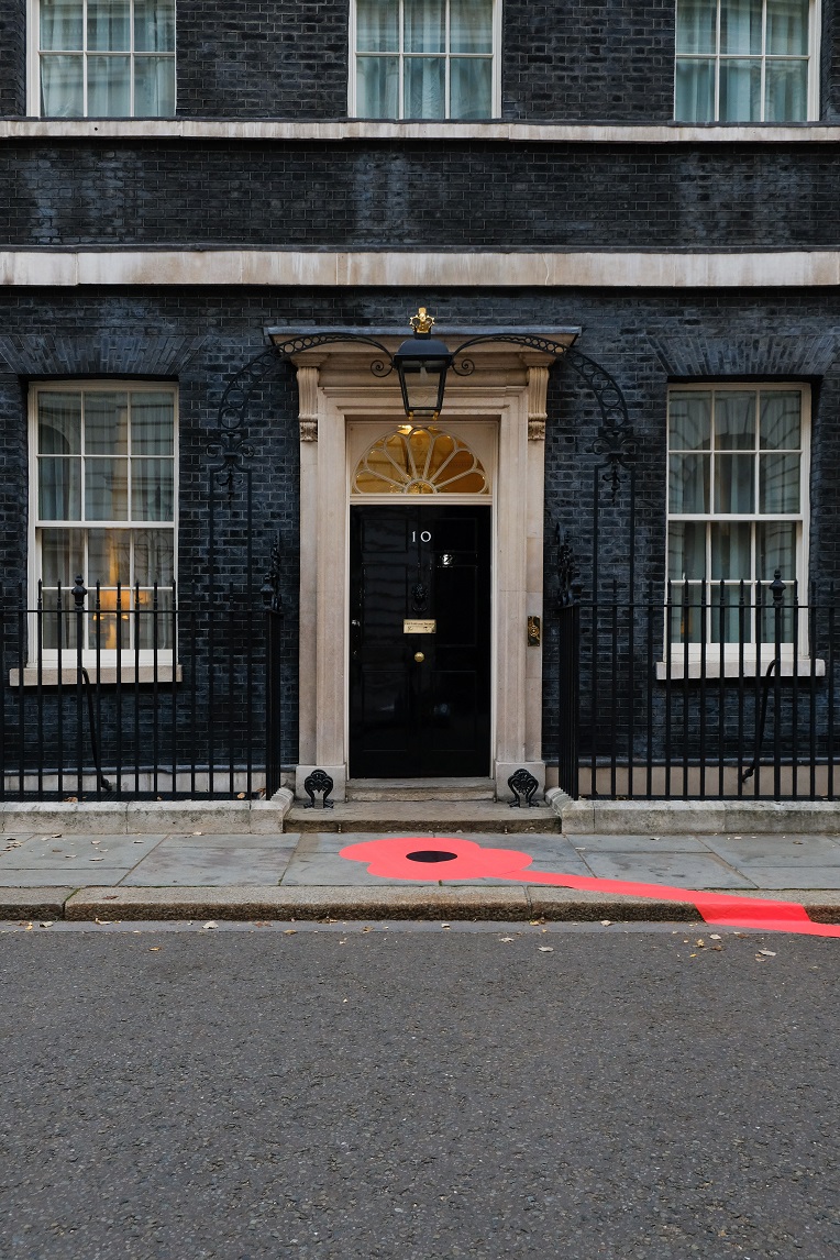 No.10 Downing Street features in this year’s national Poppy Appeal launch as the location the Prime Minister of the day, Lloyd George, addressed a jubilant crowd to announce the First World War was over on 11 November 1918