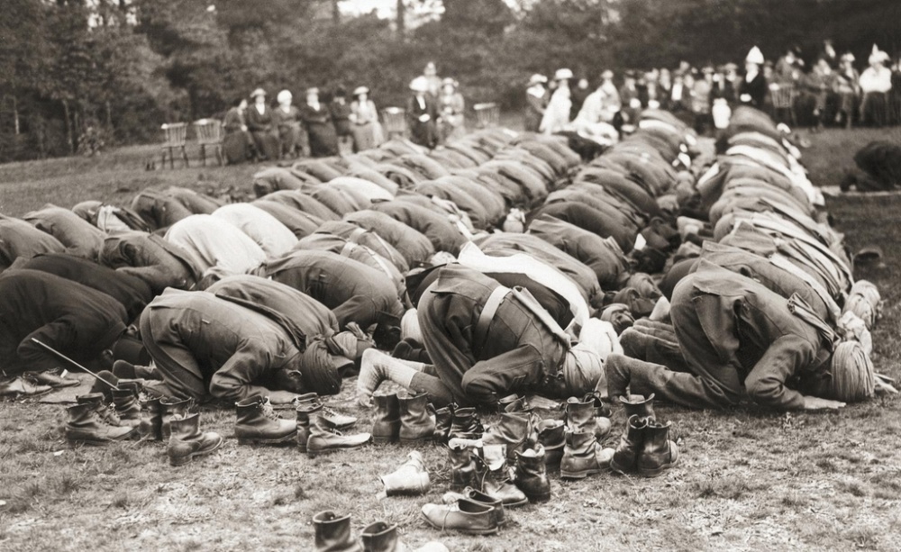 Indian troops serving with the British Army pray outside the Shah Jahan Mosque in Woking Surrey during the Muslim festival of Eid al Adha, circa 1916 