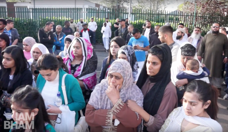 Mohammed Saleem's family and community members gather for a peace vigil in Small Heath following his brutal murder
