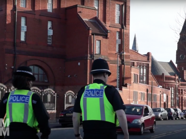 Police walking patrolling Green Lane Masjid Mosque