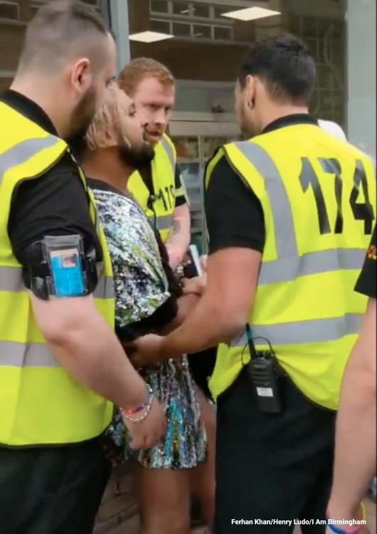 Ferhan Khan protested his eviction as security guards led him out of the Birmingham Pride area 