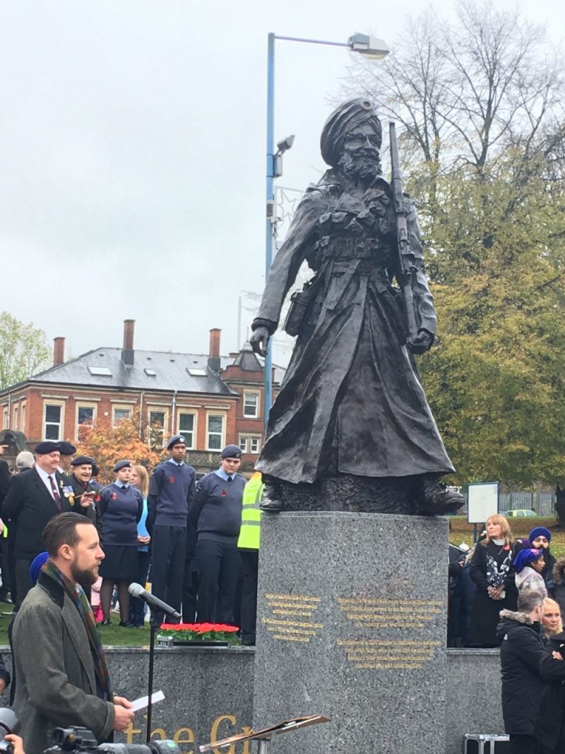 Sculptor Luke Perry speaks at the unveiling of the 'Lions of the Great War' statue