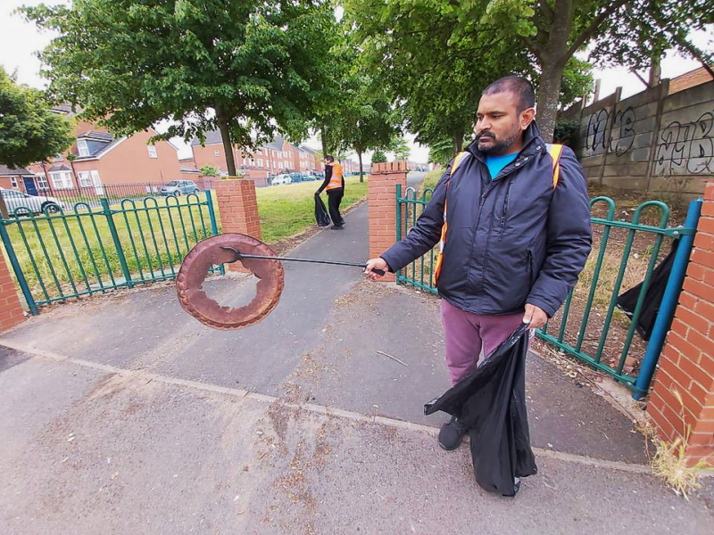 A jagged and rusted metal disc that poses a serious health hazard is removed from a children's play area
