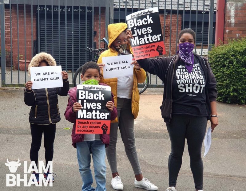 Natasha Michael is joined by her family at the Black Lives Matter protest in Victoria park, Smethwick 