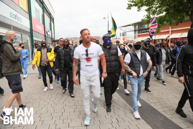Marc Gauntlett leads the anti-racism march through the city centre