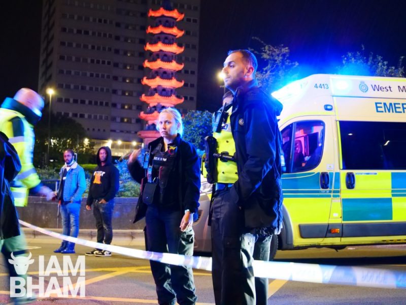 Police officers and paramedics at the scene in Birmingham city centre 