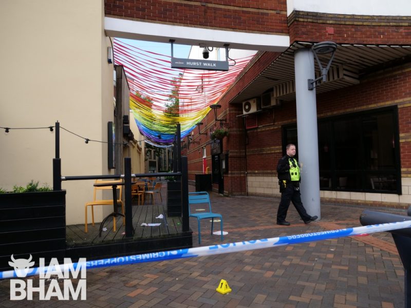 A police officer beside evidence markers at The Arcadian in Birmingham 