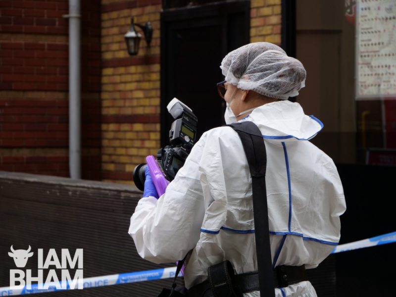Forensics scientists collect evidence along Hurst Street in Birmingham 