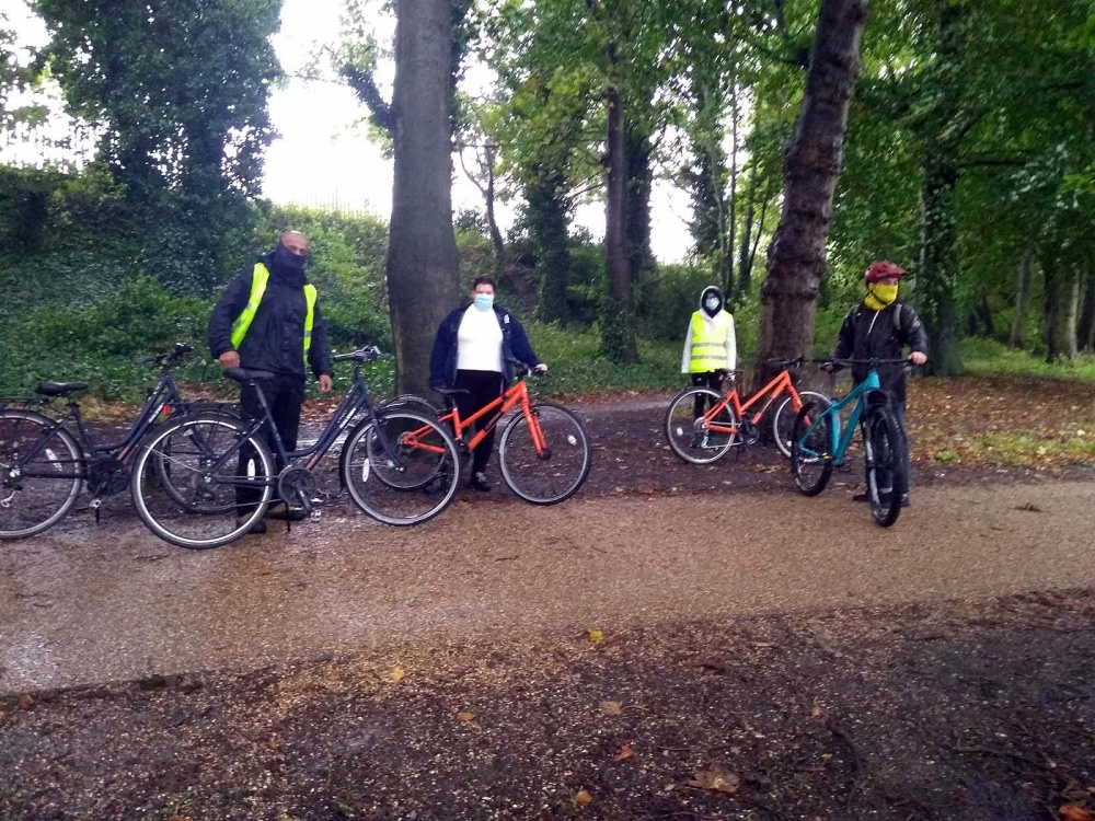 Migrants bike together at Edgbaston Reservoir to defy “hostile environment”