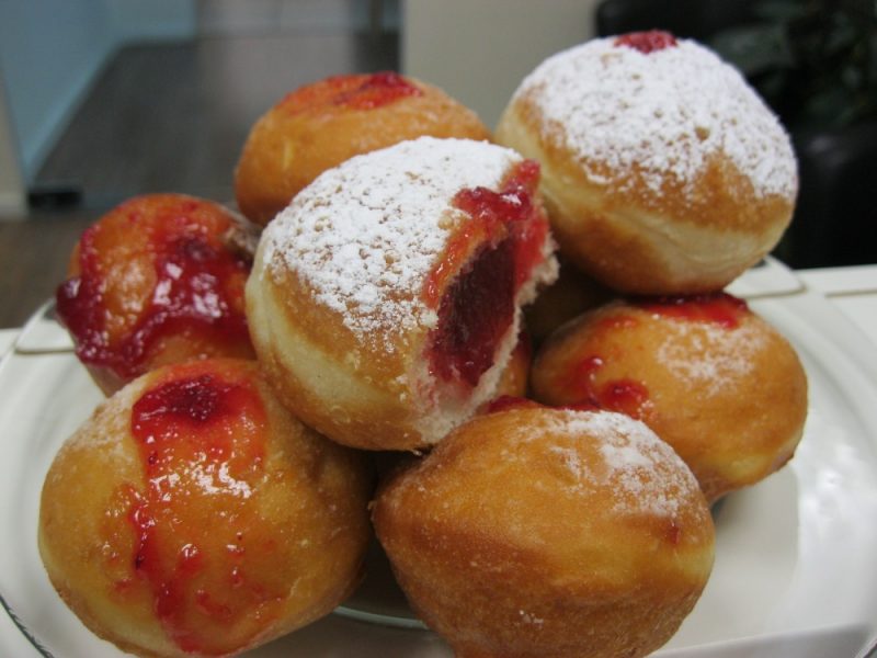 Sufganiyot doughnuts are friend in oil and enjoyed during Hanukkah celebrations 