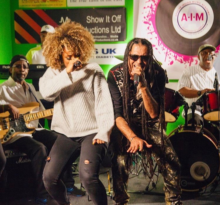 Apache Indian performs with singer Fleur East at AIM Academy in Birmingham