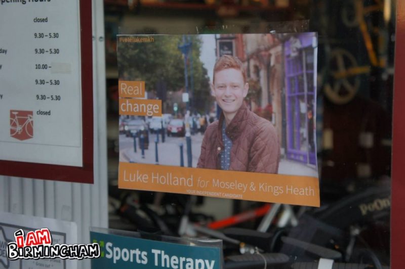 A local bike shop displays one of Luke Holland’s election posters