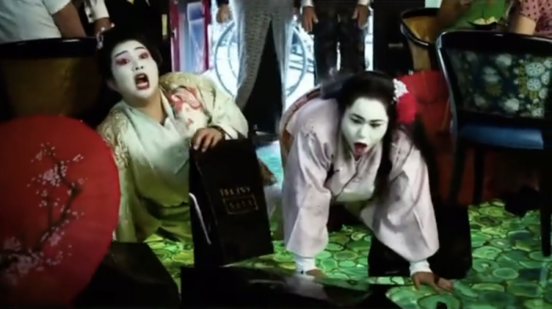 Two women are featured in the advert styled into clumsy and squealing 'Geisha girls' 