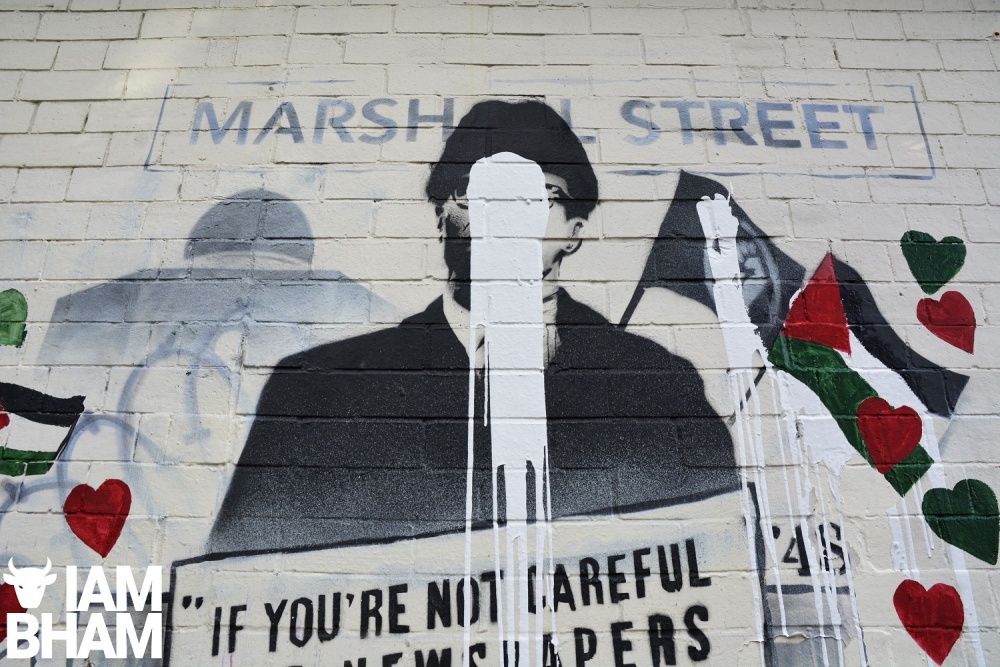 Community comes together to salvage defaced Malcolm X mural supporting Palestine