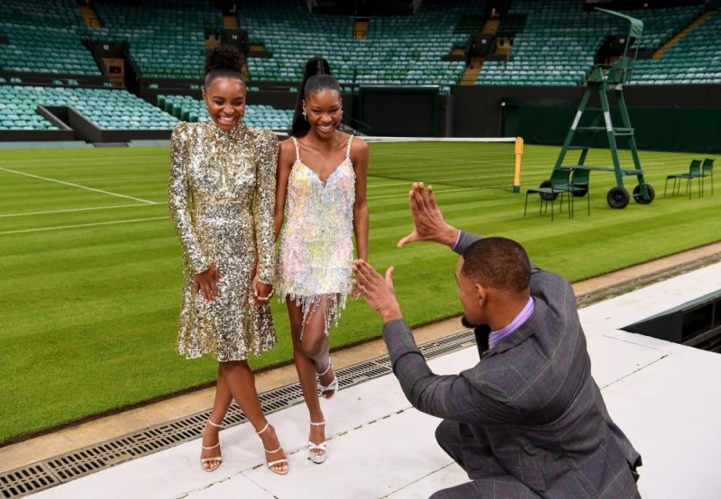 Will Smith enjoys a lighter moment with co-stars Demi Singleton and Sanniya Sidney at Wimbledon in London 