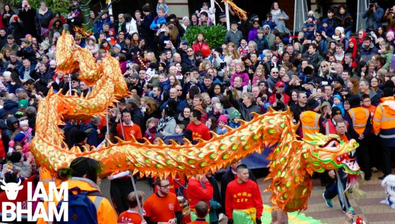 A dragon weaves through the crowds in Southside during the Chinese New Year celebrations in Birmingham