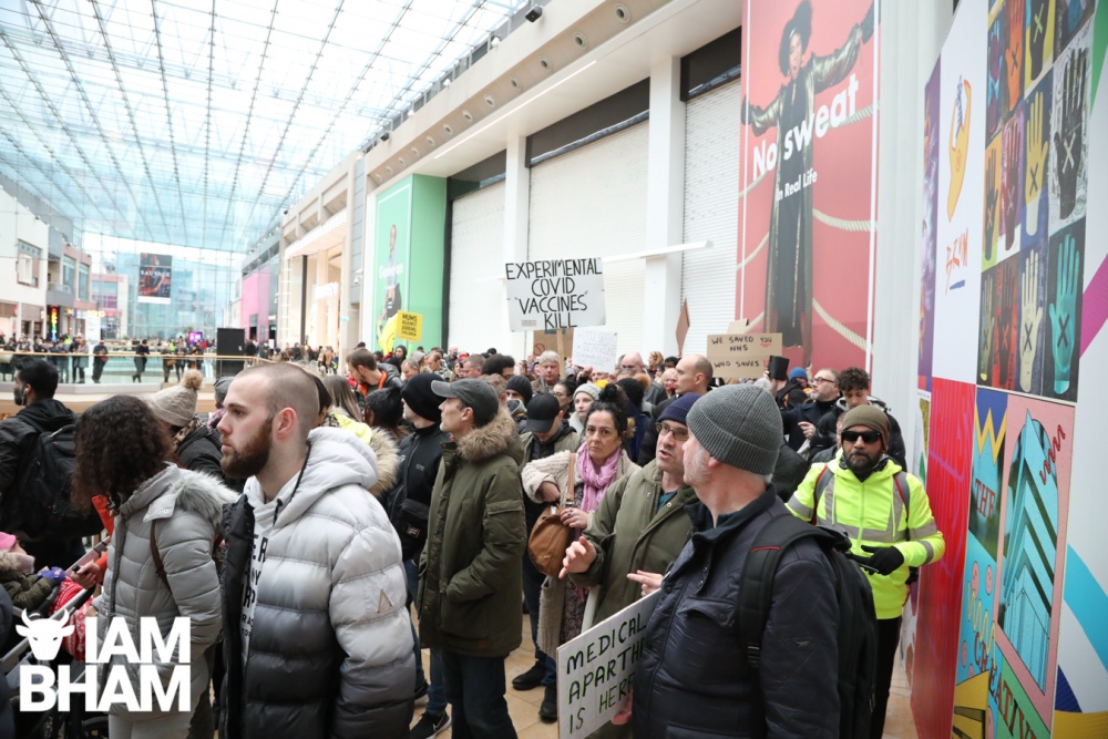 Protesters march through the Birmingham Bullring, leaving shoppers and security staff surprised 