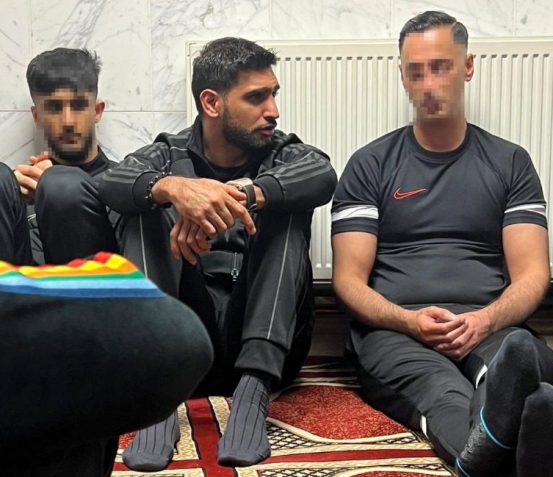 Boxer Amir Khan (middle) travelled to the West Midlands to offer up prayers for Ali Tazeem