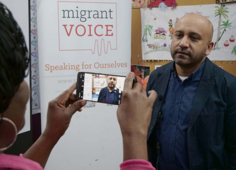 A Migrant Voice member interviews former BBC and Al Jazeera journalist Hasan Patel from Birmingham