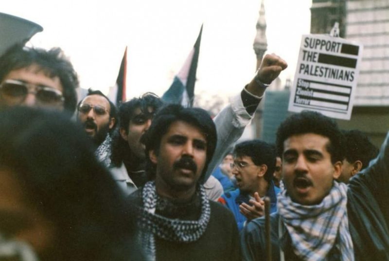 Activist and photographer Mukhtar Dar (centre) has been documenting protests for several decades