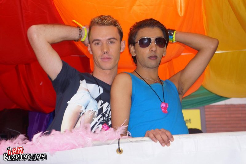 Young guys posing on a float at Birmingham Pride