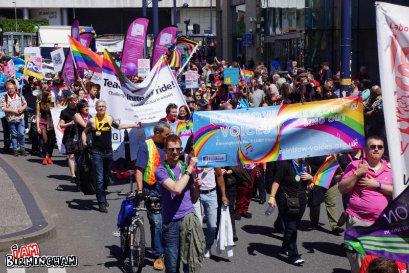 Birmingham Pride parade marching through the city centre