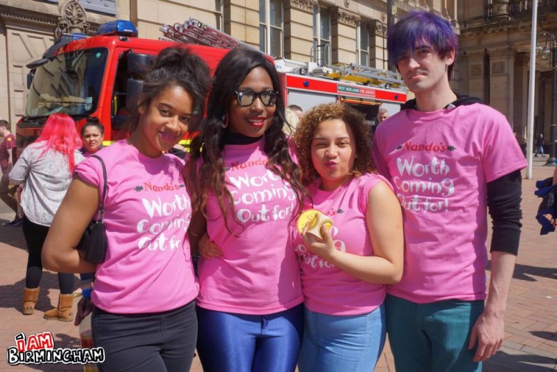 Nandos restaurant staff in pink t-shirts at Birmingham Pride