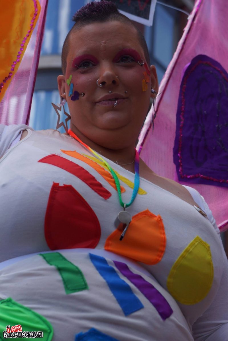 Reveller with rainbow t-shirt at Pride 