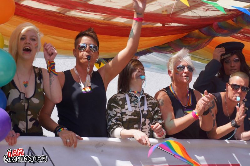Revellers on a Pride parade float in Birmingham 