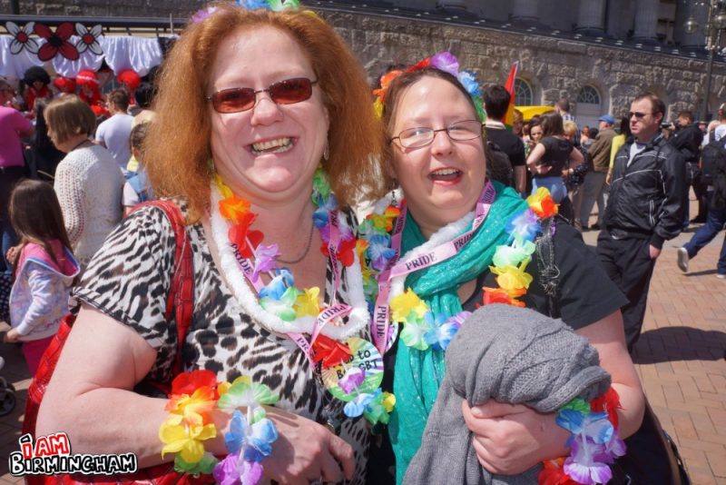 Two women smiling at Birmingham Pride 
