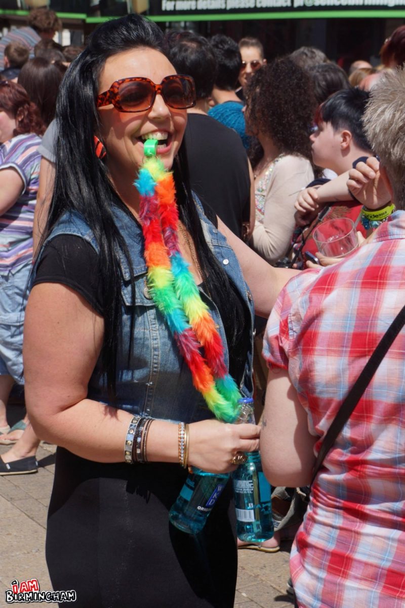 Woman with whistle at Pride 