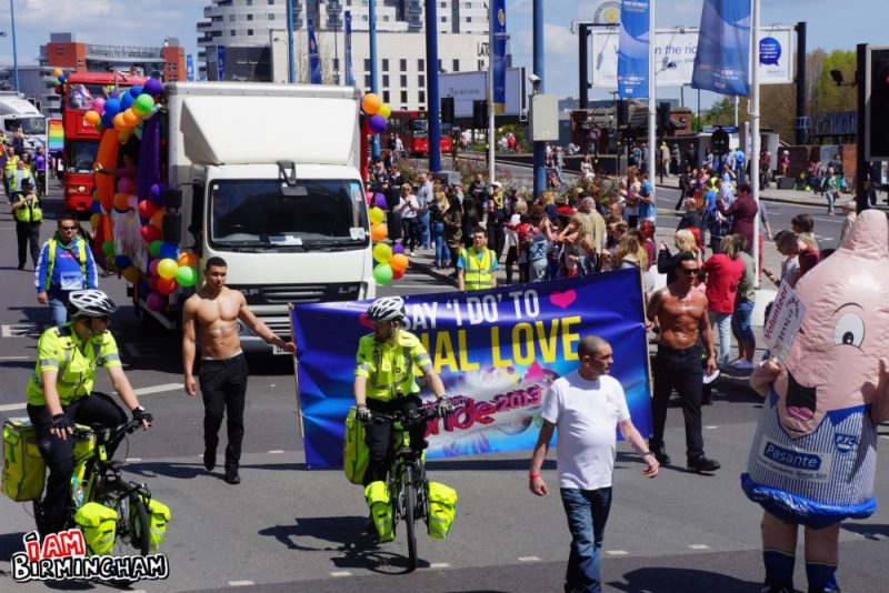 Pride parade with floats in Moor Street 