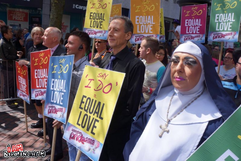 Human rights activist Peter Tatchell leads the Birmingham Pride 2013 parade alongside Pride director Lawrence Barton and Michael Cashman MEP 