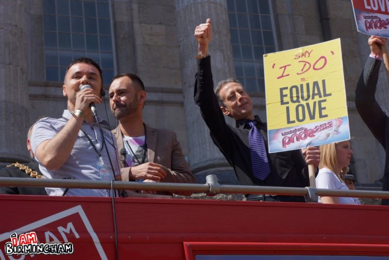 L-R: Birmingham Pride director Lawrence Barton speaks, standing alongside co-director David Nash, and human rights activist Peter Tatchell 