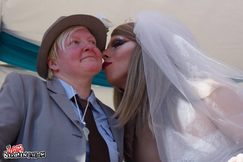 Drag bride and groom kissing costumes at Birmingham Pride