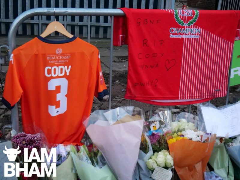 Cody Fisher's football team shirts have been placed at the site of his death in memory of the young sportsman 