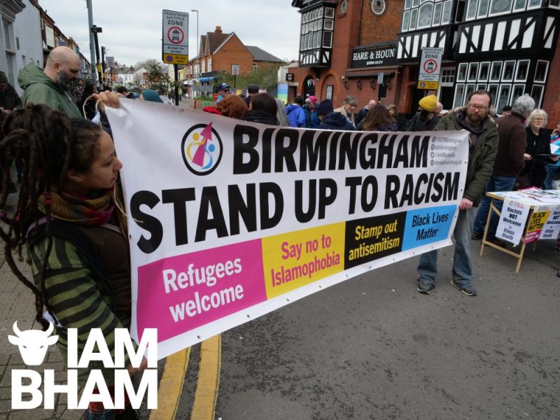 Birmingham Stand Up To Racism banner in front of Hare and Hounds in Kings Heath 