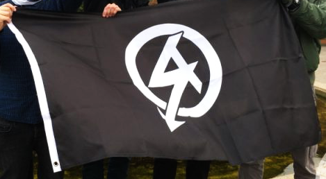 The flag of banned neo-Nazi group National Action was shared on social media by Osborne