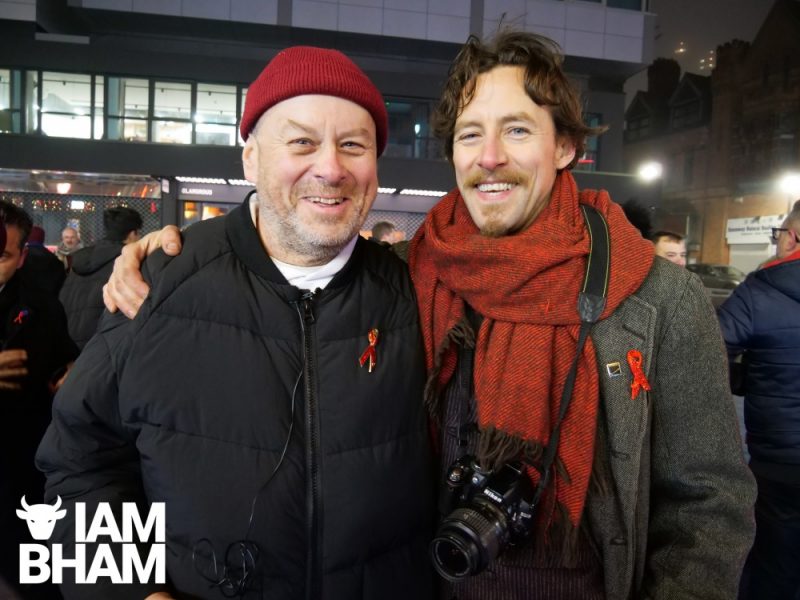 Gay artist Garry Jones with West Midlands sculptor Luke Perry at the World Aids Day 2023 vigil in Birmingham UK, at The Ribbons sculpture in Hurst Street on 01.12.2023 