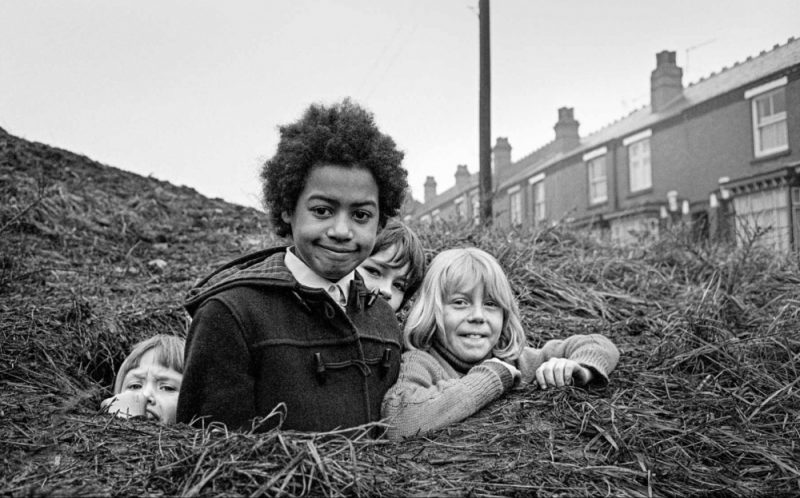Four youngsters in their railway embankment 'camp' off Bradleymore Road, Brockmoor in 1976