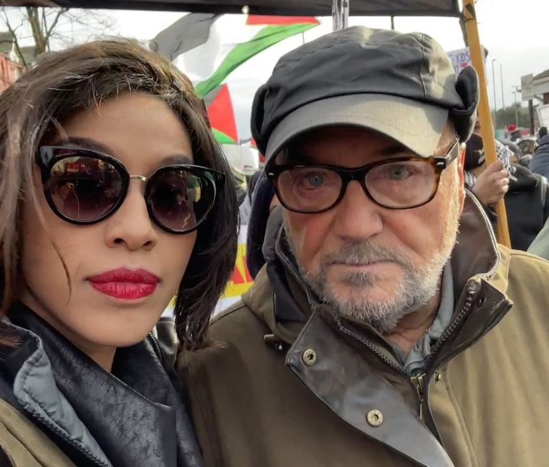 George Galloway and his wife Putri Gayatri Pertiwi at the Birmingham rally for Gaza on Saturday 20 January 2024